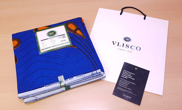 VLISCO Stoff Hollandais Afrikanischer Wax print - Blau / Orange Electric Bulb
