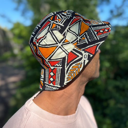 Bucket hat / Fischerhut mit afrikanischem Print - Rot & Orange Bogolan Symbols - Kinder & Erwachsene Größen (Unisex)