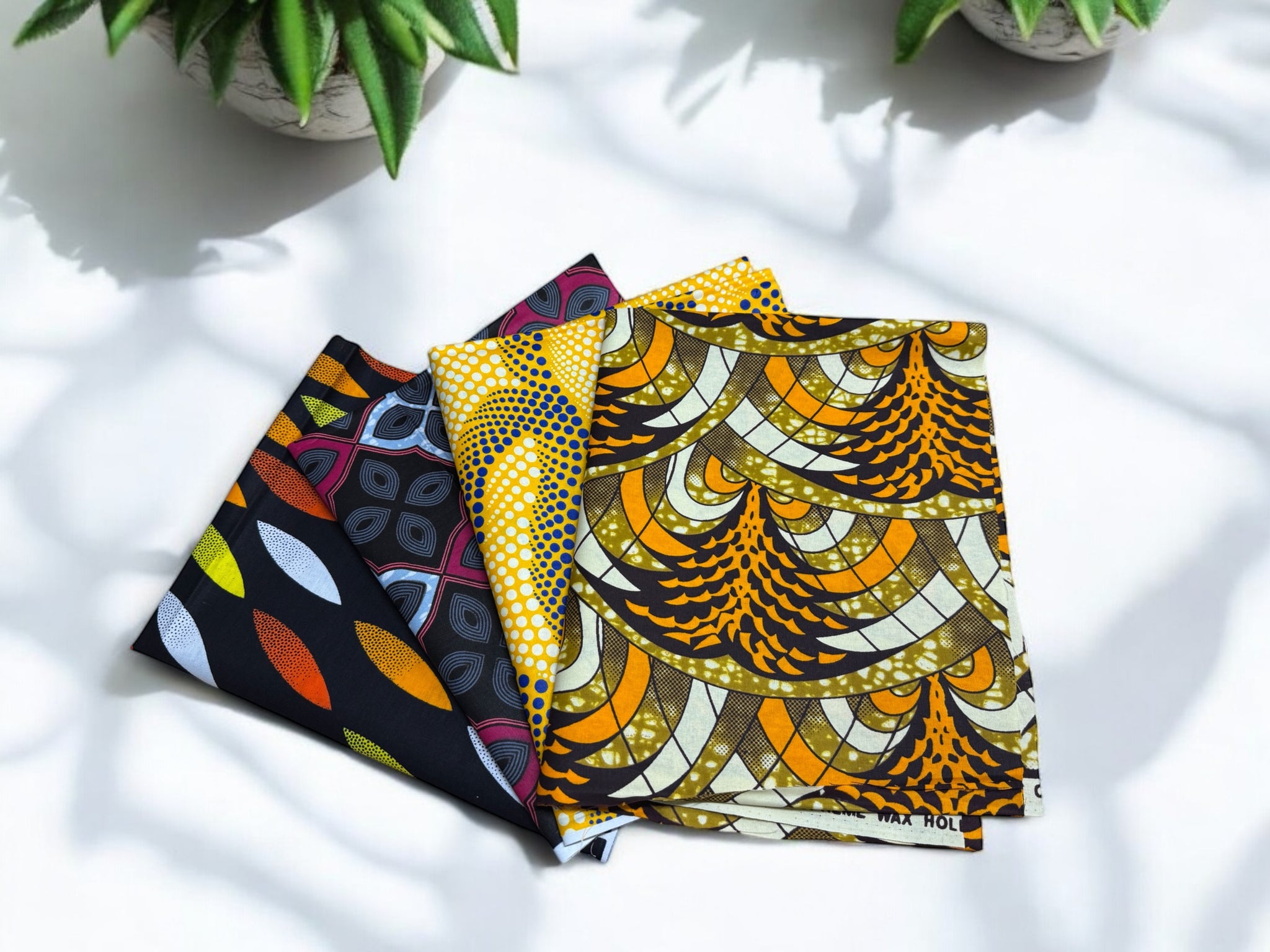 4 Fat Quarters - Mix 2 Patchworkstoffe / Quiltingstoffe - Afrikanischer Stoff