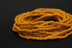 Waist Beads / Afrikanische Taillenkette - AIGBE - Ockergelb (elastisch)